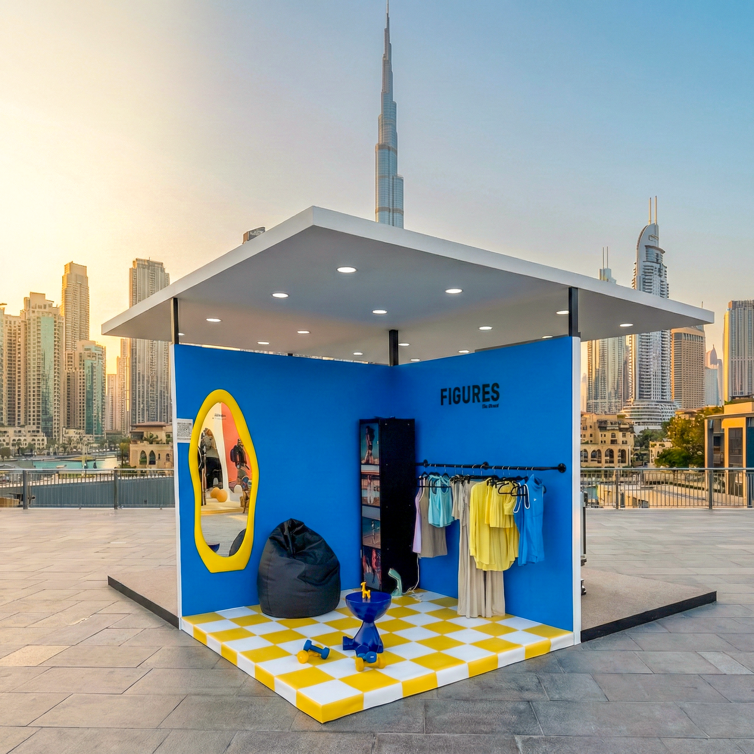 Blue and yellow store with 'Figures' branding against a city skyline.